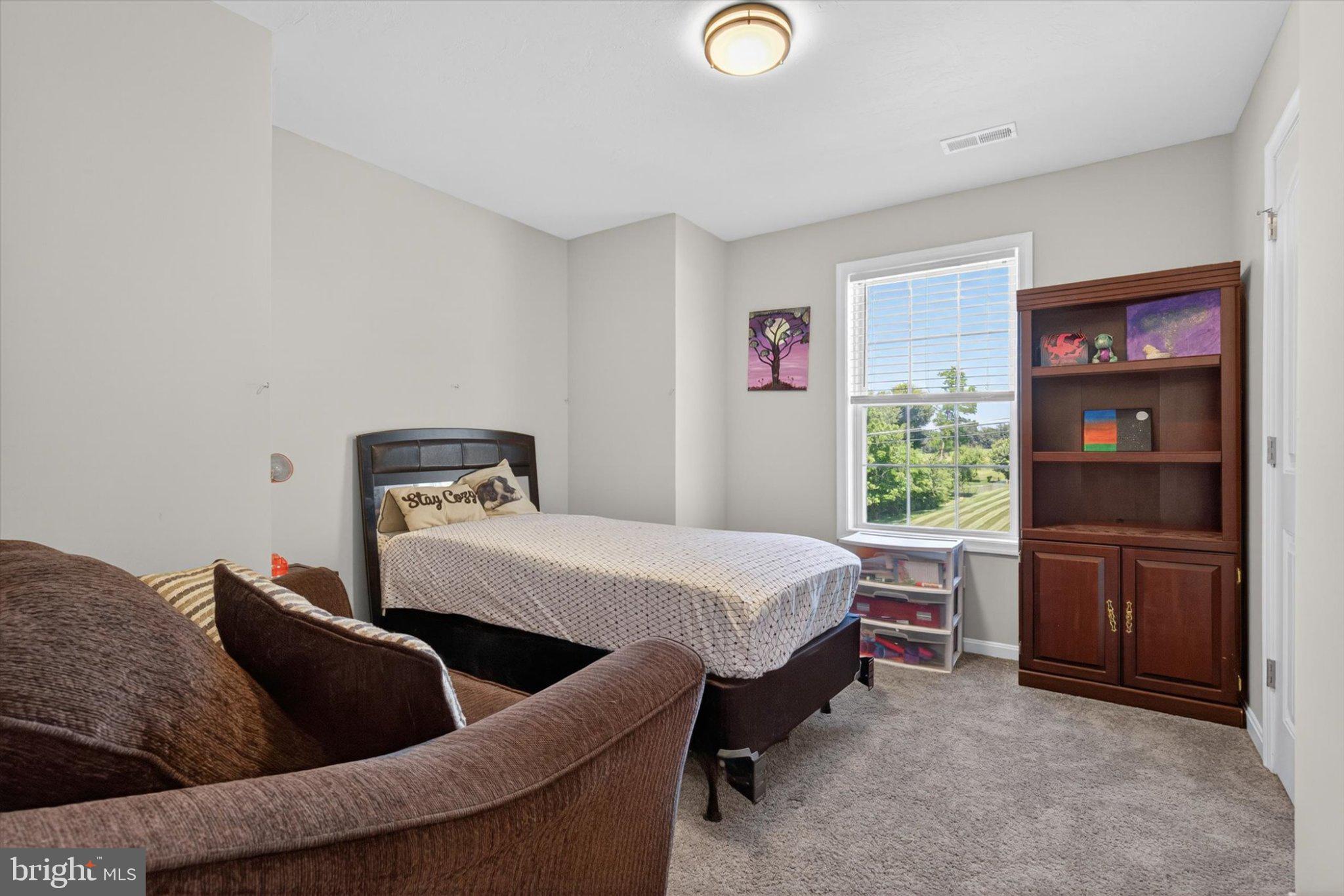 255 Kinneman Road Abbottstown, PA 17301 - Photo 21 of 39 Cozy bedroom with natural light.