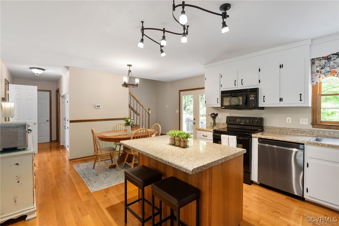 12207 Balta Road Chesterfield, VA 23838 - Photo 18 of 50 Kitchen featuring black appliances, light countert