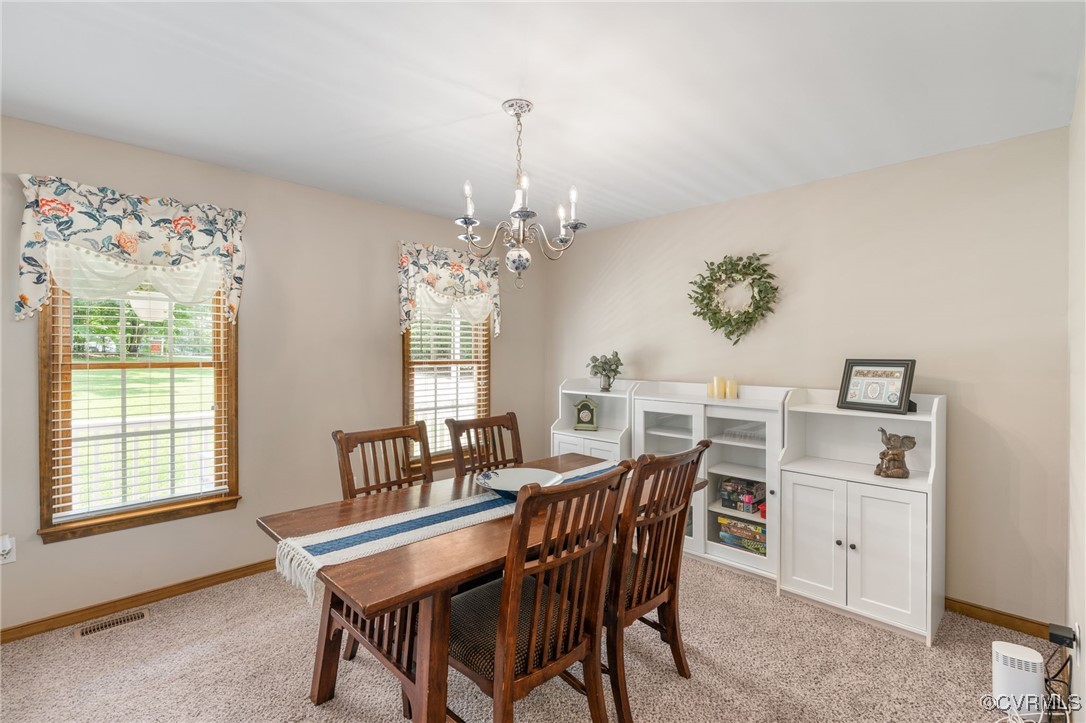 12207 Balta Road Chesterfield, VA 23838 - Photo 22 of 50 Dining space featuring a chandelier, light carpet,