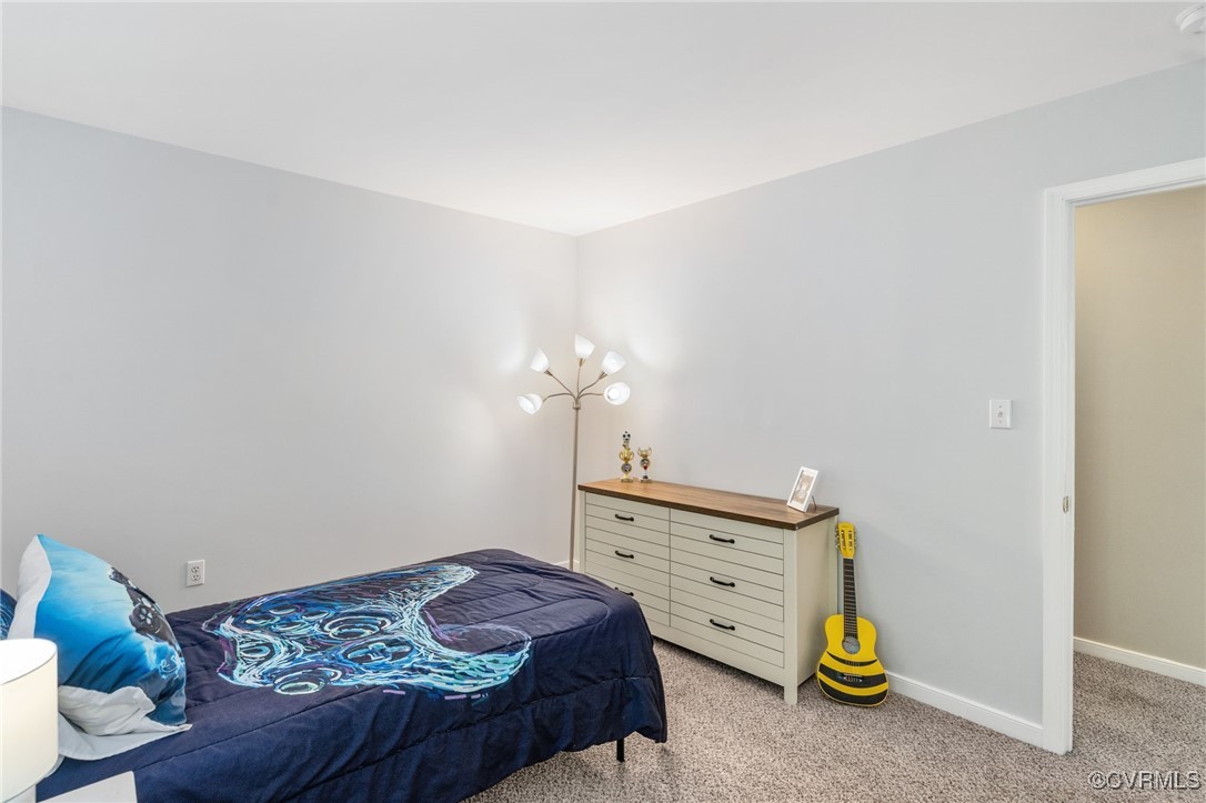 12207 Balta Road Chesterfield, VA 23838 - Photo 32 of 50 Bedroom with light colored carpet and baseboards