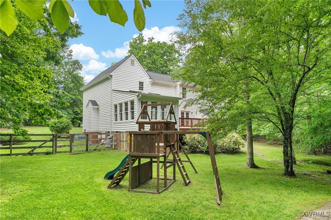 12207 Balta Road Chesterfield, VA 23838 - Photo 43 of 50 Rear view of property featuring a playground