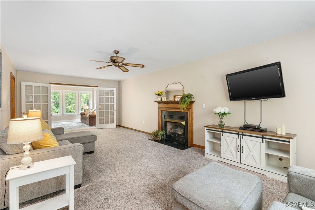 12207 Balta Road Chesterfield, VA 23838 - Photo 8 of 50 Carpeted living area featuring ceiling fan, basebo
