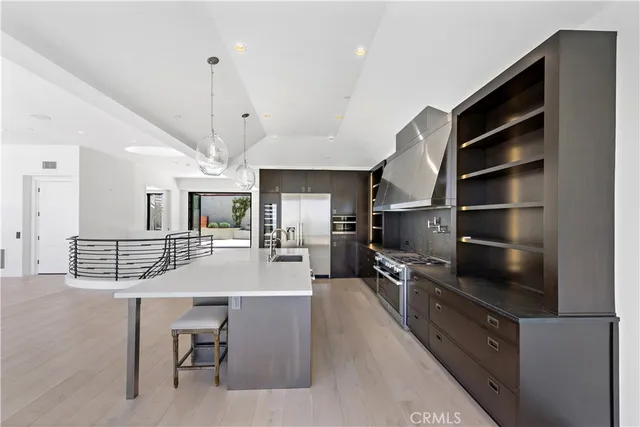 a view of a livingroom with furniture and windows