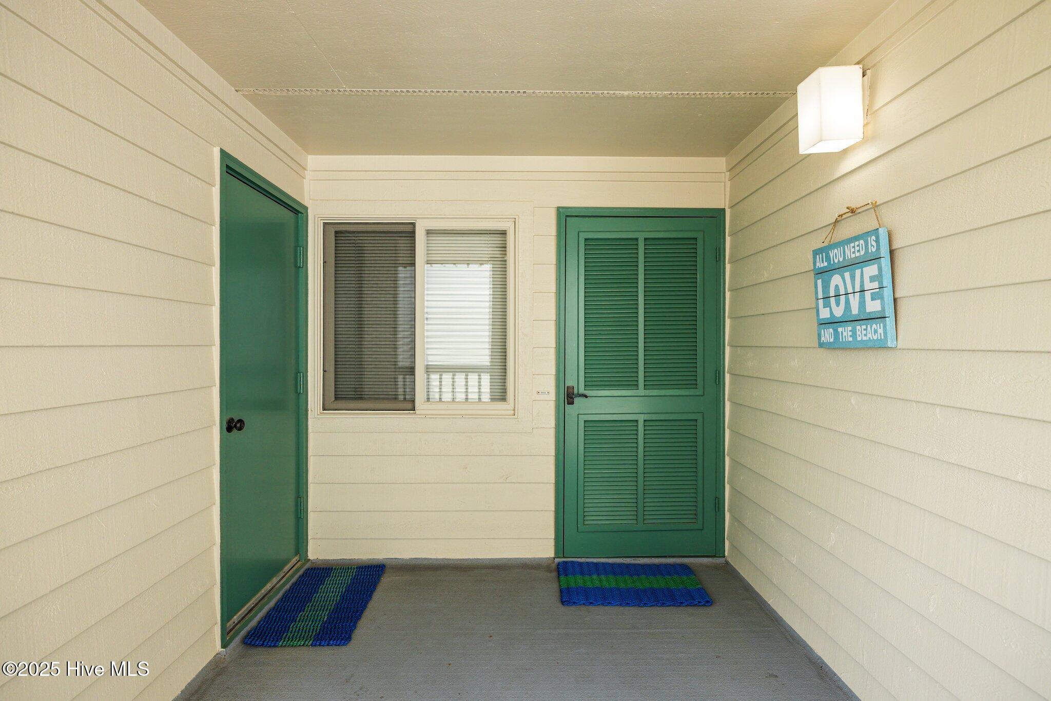 10300 Coast Guard Road, Unit E206 POINT EMERALD VILLAS Emerald Isle, NC 28594 - Photo 2 of 42 IMG_0344