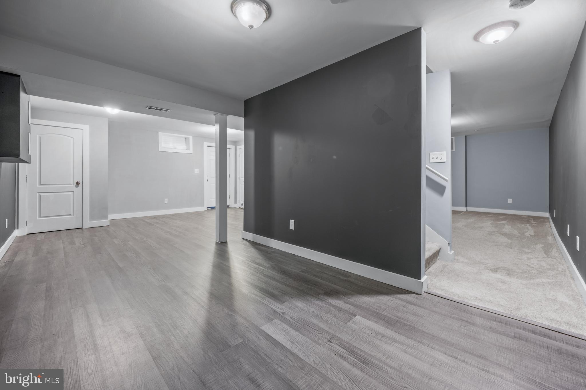 3319 Mail Road Westminster, MD 21157 - Photo 37 of 70 an empty room with wooden floor & windows