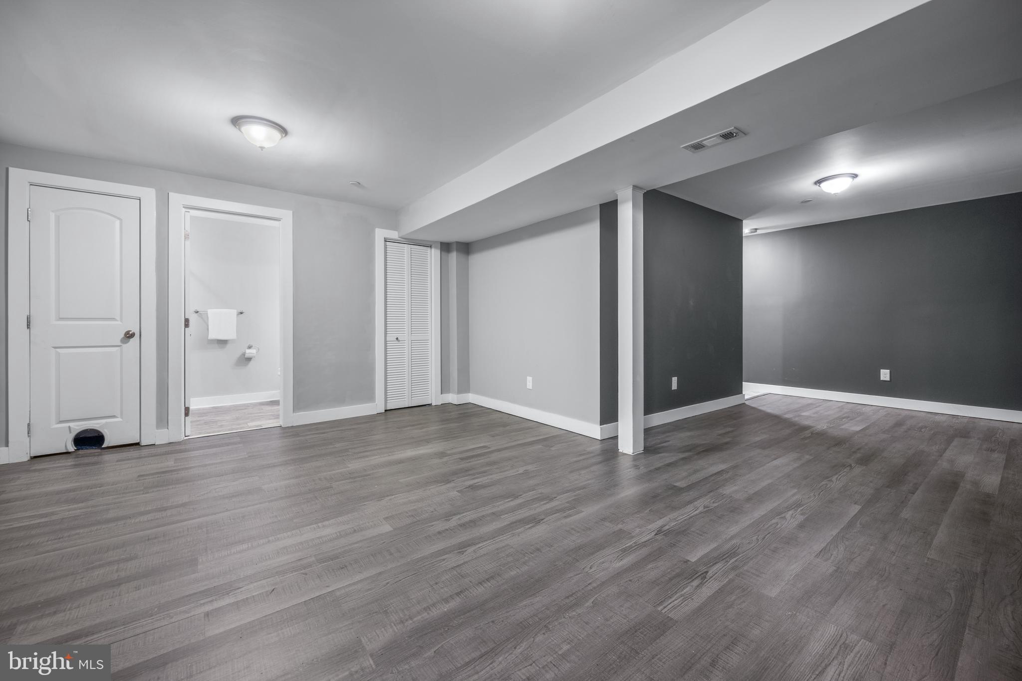 3319 Mail Road Westminster, MD 21157 - Photo 38 of 70 a view of an empty room with wooden floor