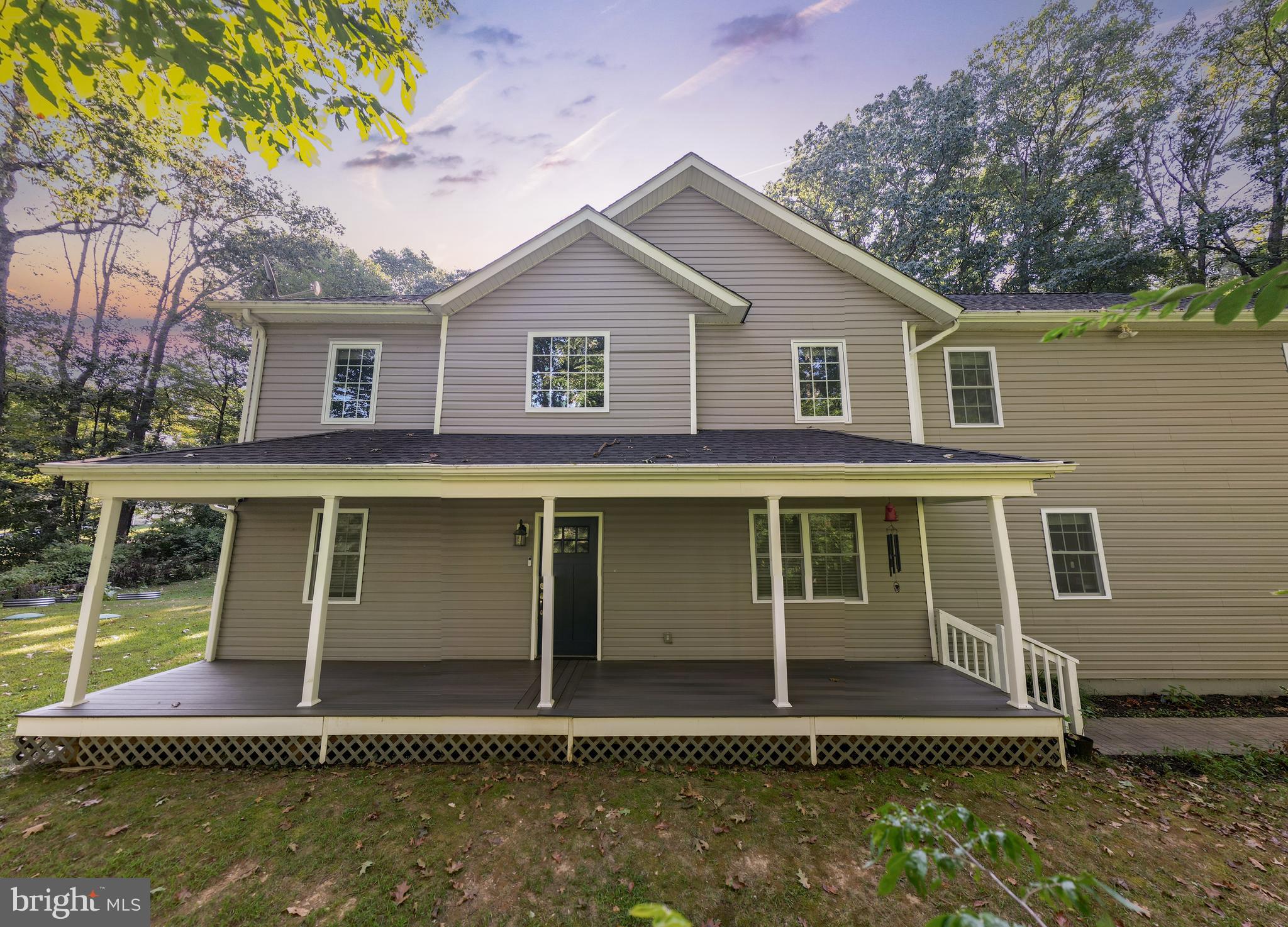 3319 Mail Road Westminster, MD 21157 - Photo 5 of 70 a front view of a house with a yard