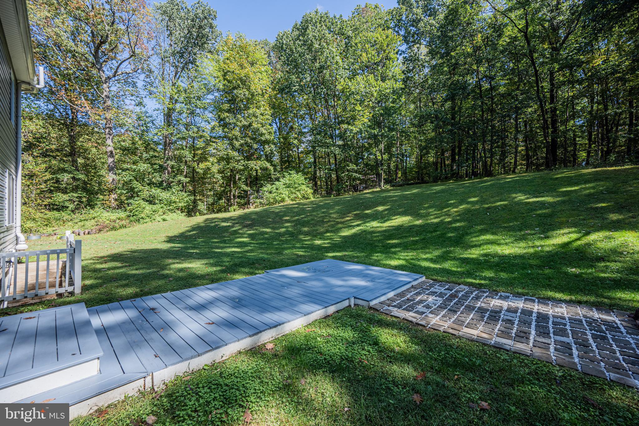 3319 Mail Road Westminster, MD 21157 - Photo 63 of 70 a view of a backyard with a garden