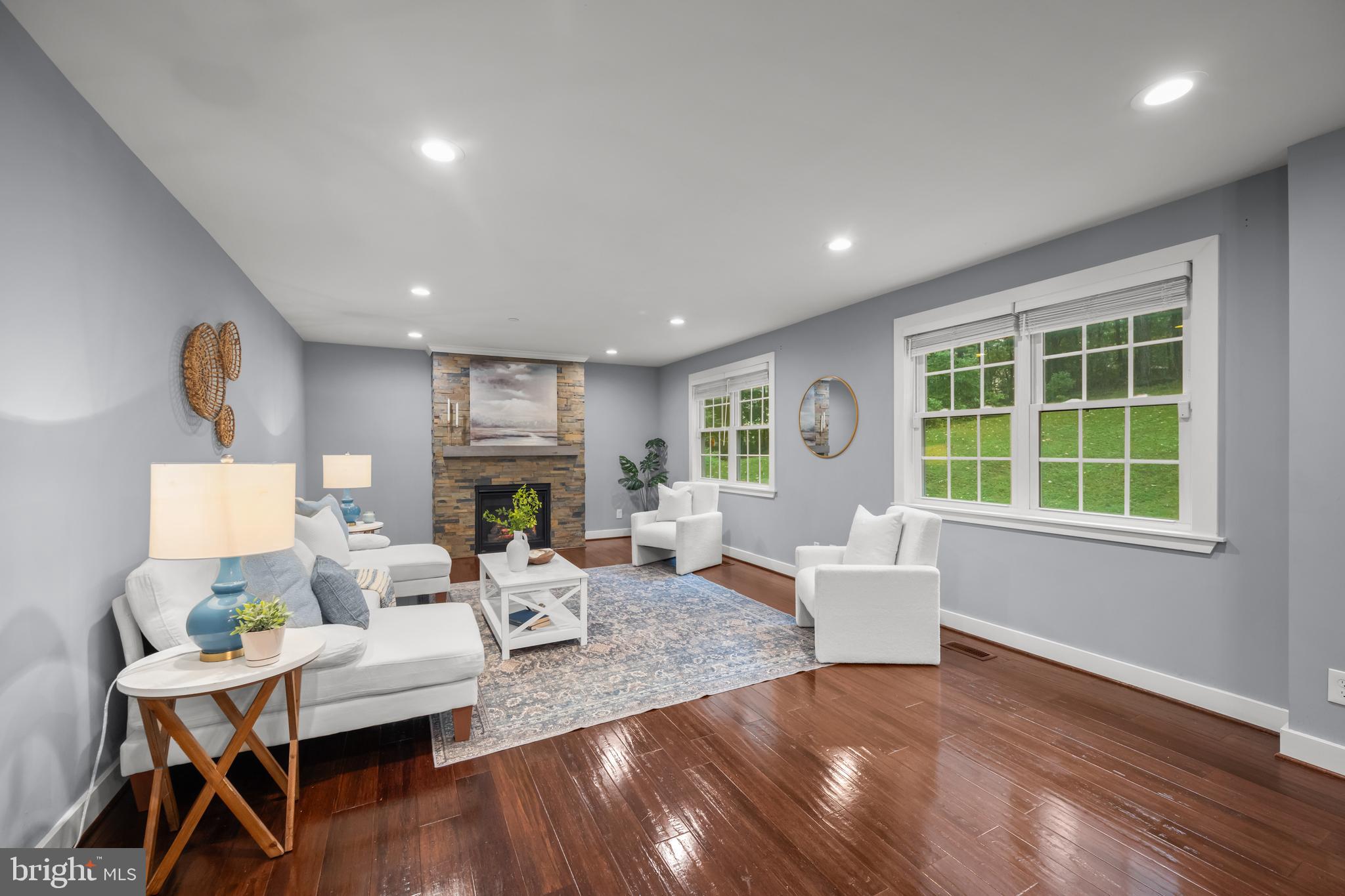 3319 Mail Road Westminster, MD 21157 - Photo 10 of 70 a living room with fireplace furniture and a wooden floor