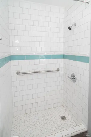 a bathroom with a sink and mirror