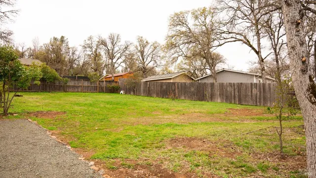 a swimming pool with wooden fence