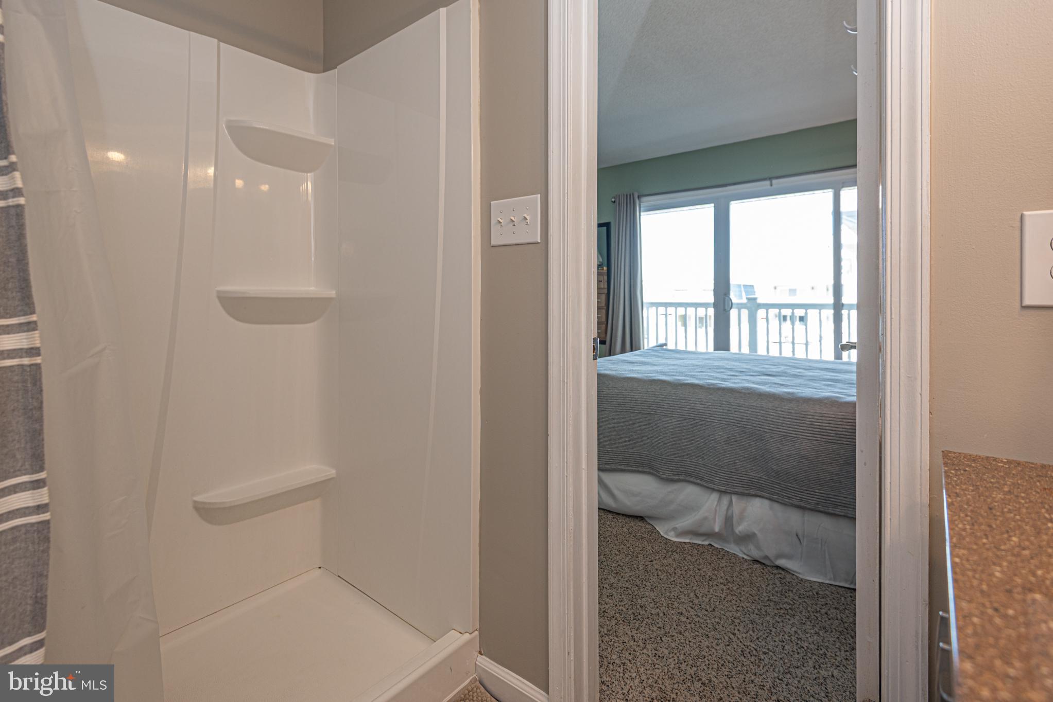 702 Bradley Road, Unit 11 Ocean City, MD 21842 - Photo 47 of 92 a bathroom with a shower