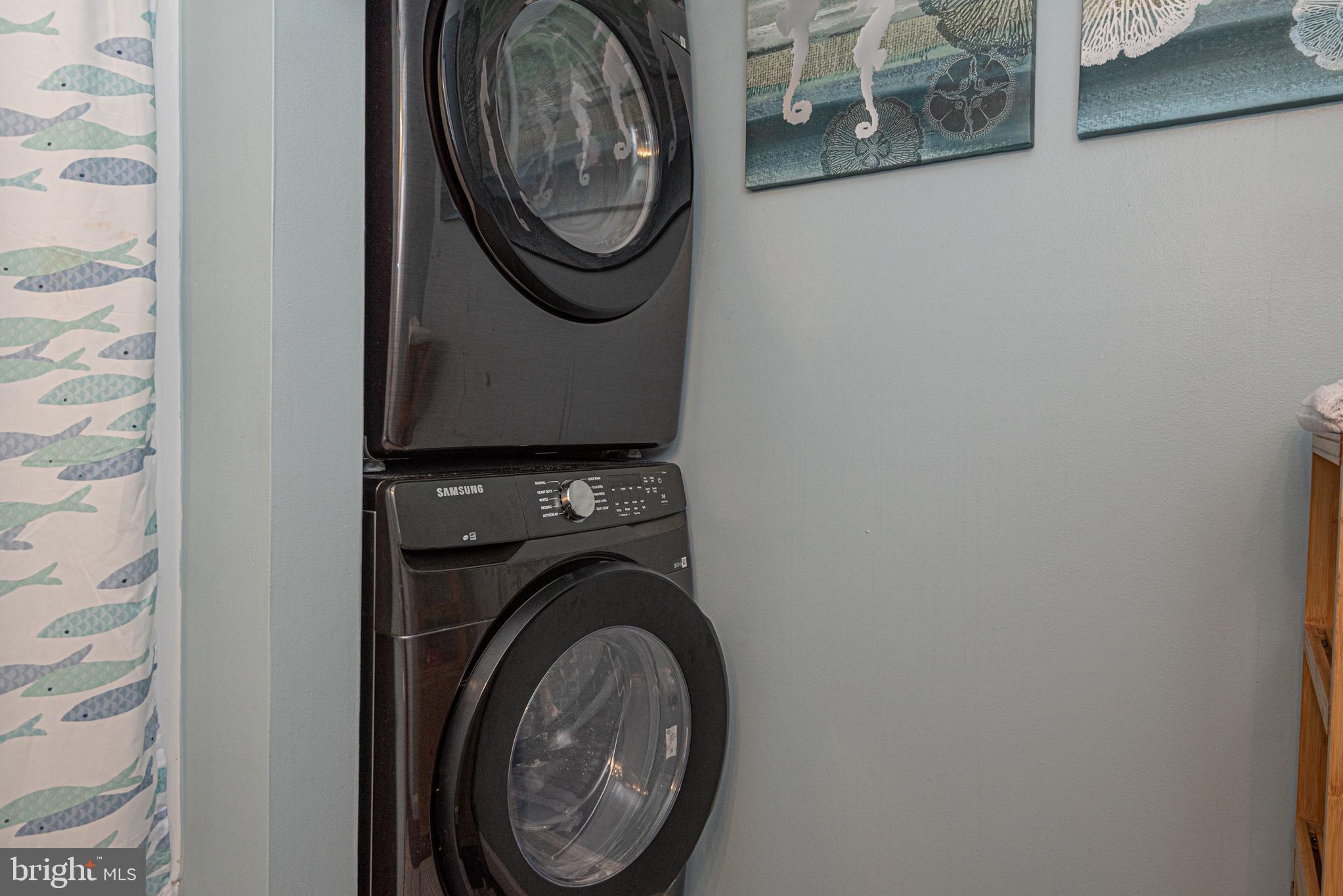 702 Bradley Road, Unit 11 Ocean City, MD 21842 - Photo 53 of 92 a close up view of a washer and dryer
