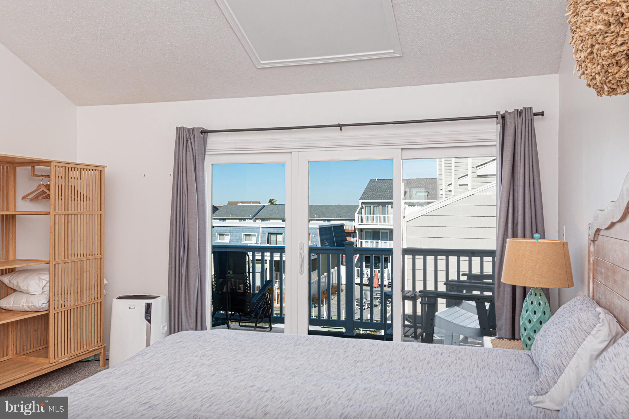 702 Bradley Road, Unit 11 Ocean City, MD 21842 - Photo 70 of 92 a view of a livingroom with furniture and entryway