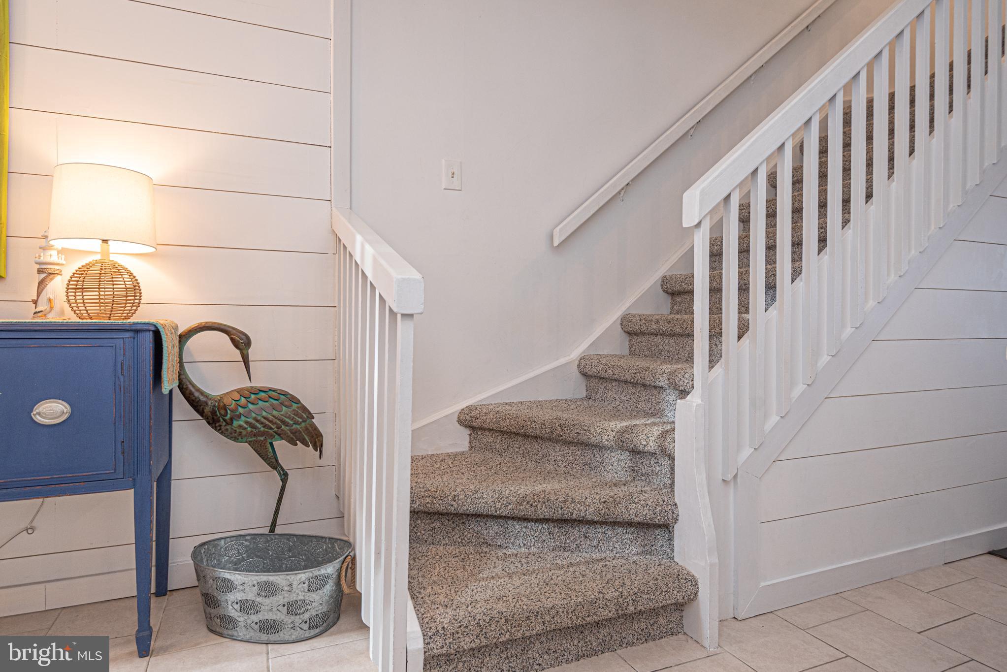 702 Bradley Road, Unit 11 Ocean City, MD 21842 - Photo 7 of 92 a picture of stairs