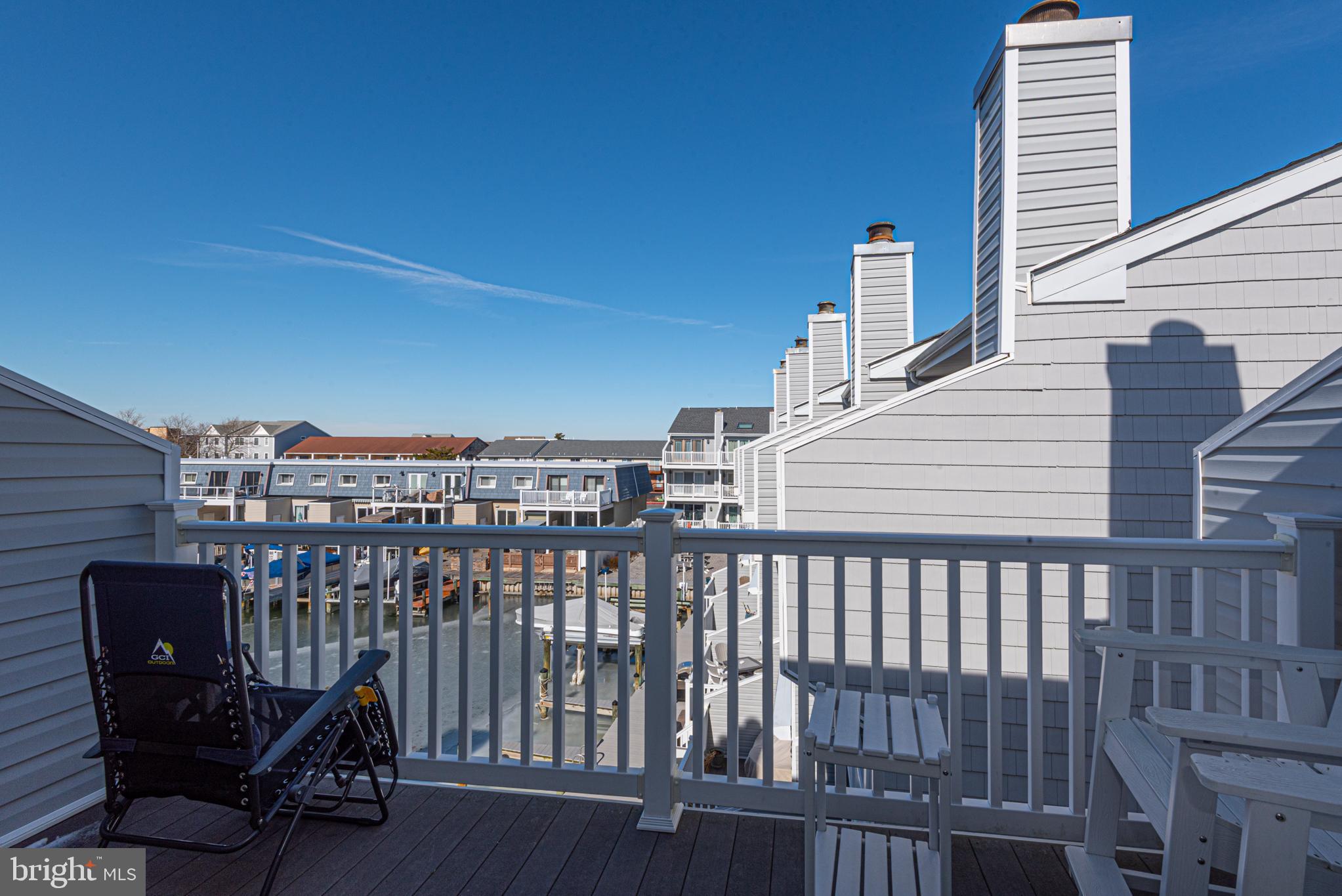 702 Bradley Road, Unit 11 Ocean City, MD 21842 - Photo 72 of 92 a view of a balcony with chairs