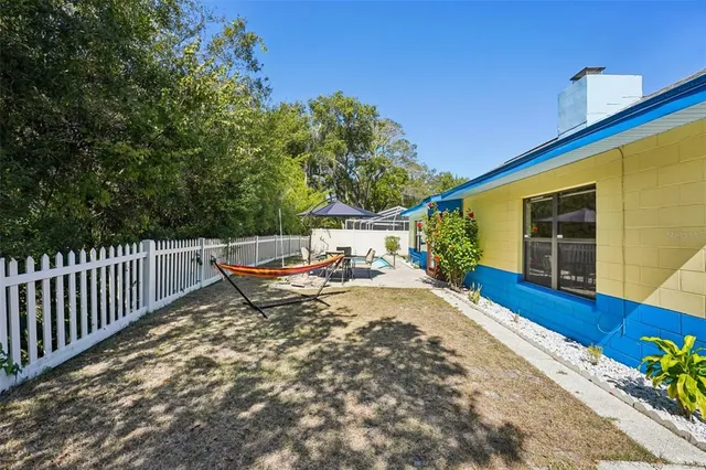 a view of a chairs and tables in the balcony