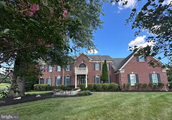 front view of house with a yard