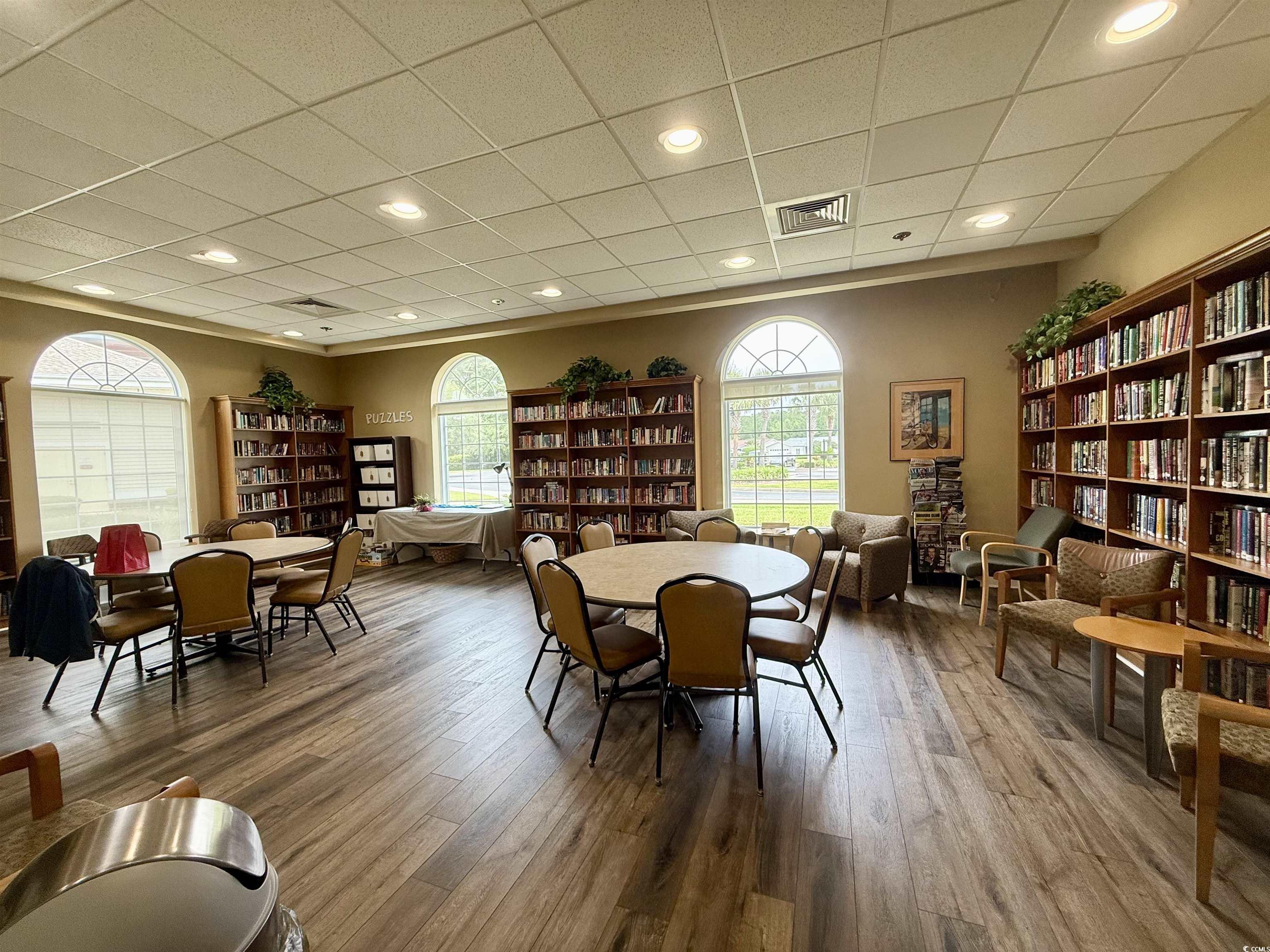 216 Walden Lake Road Conway, SC 29526 - Photo 30 of 40 Dining area with wood finished floors and a paneled ceiling