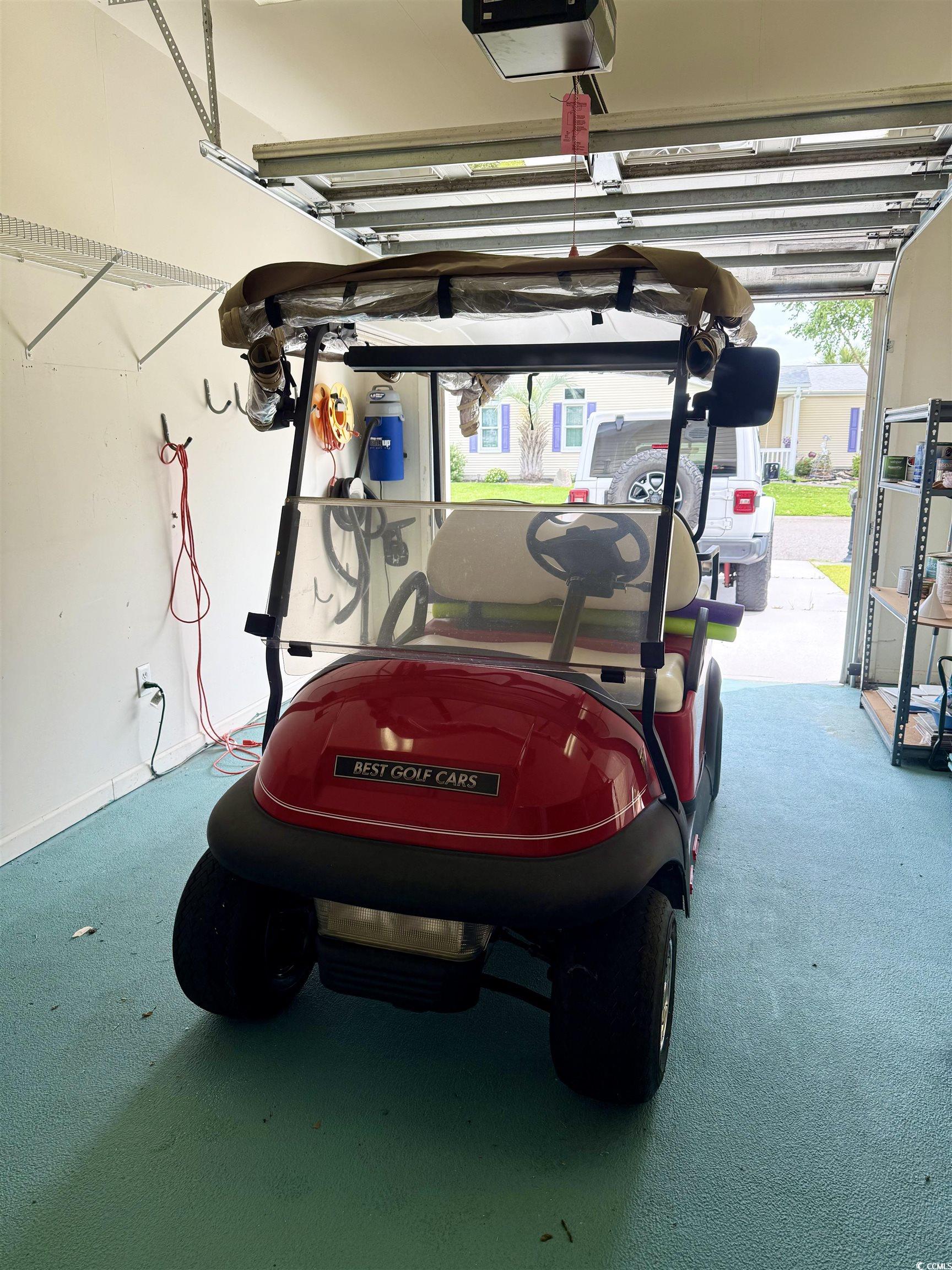 216 Walden Lake Road Conway, SC 29526 - Photo 38 of 40 Garage featuring a garage door opener