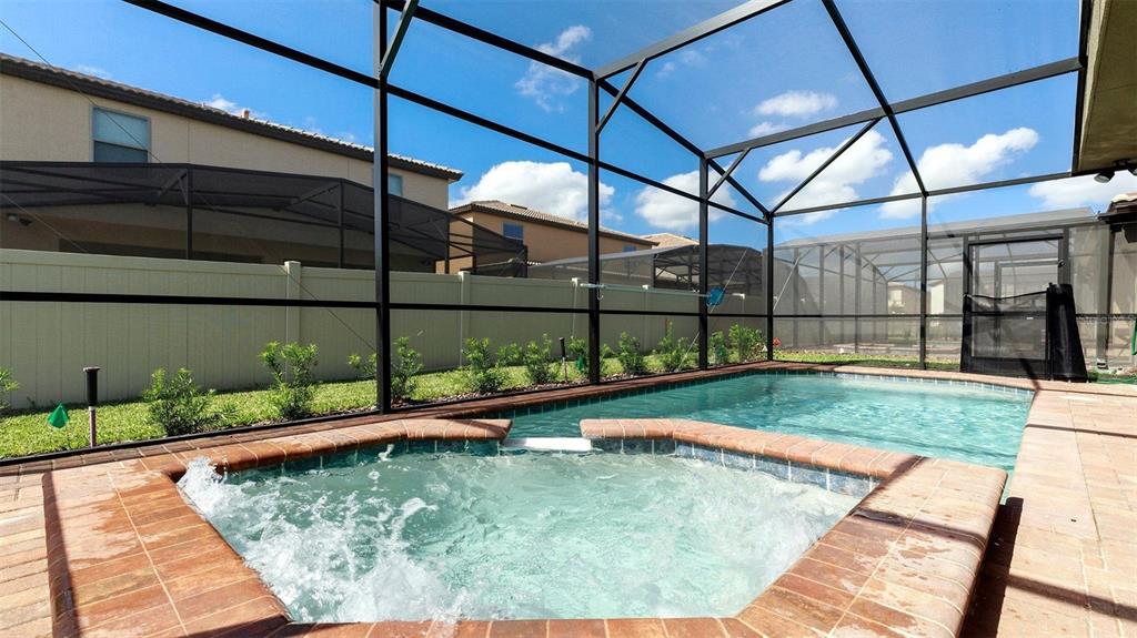 8894 Qin Loop Davenport, FL 33896 - Photo 25 of 47 a view of a backyard