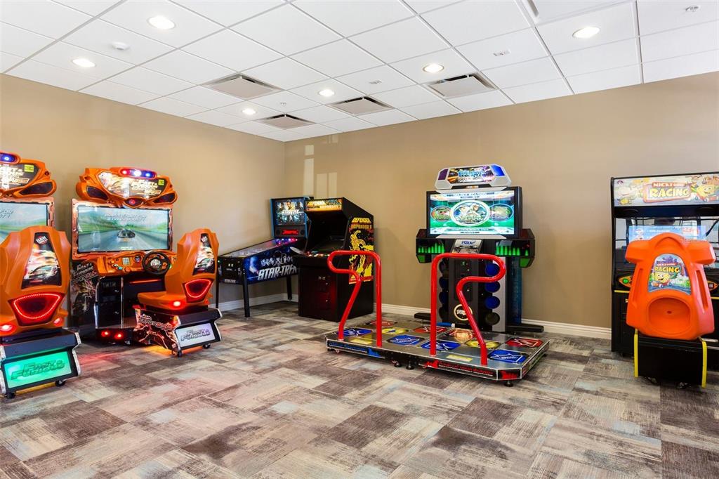 8894 Qin Loop Davenport, FL 33896 - Photo 45 of 47 a view of a room with gym equipment