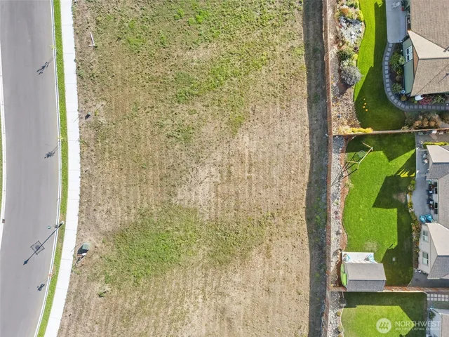 a bathroom with a shower and a mirror