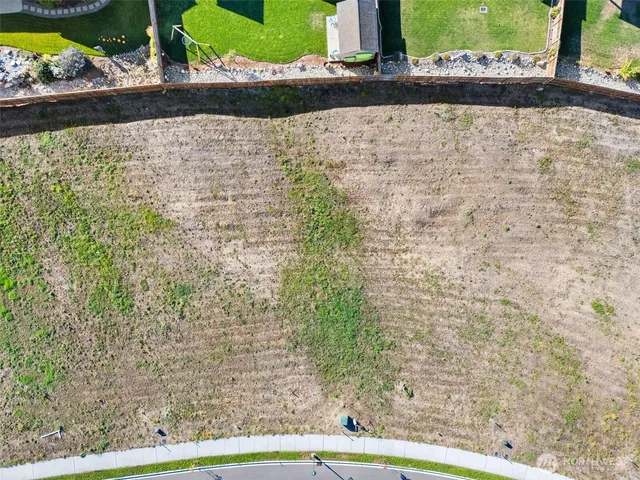 a view of wooden floor and a bench