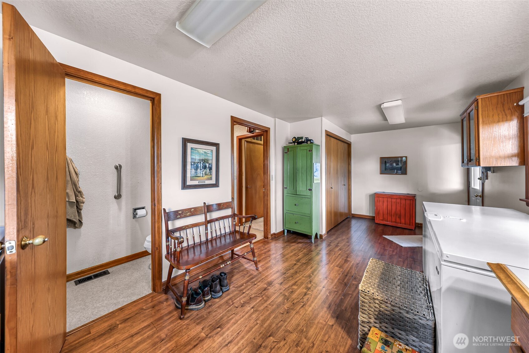 8634 Double Ditch Road Lynden, WA 98264 - Photo 14 of 40 a living room with furniture and a wooden floor