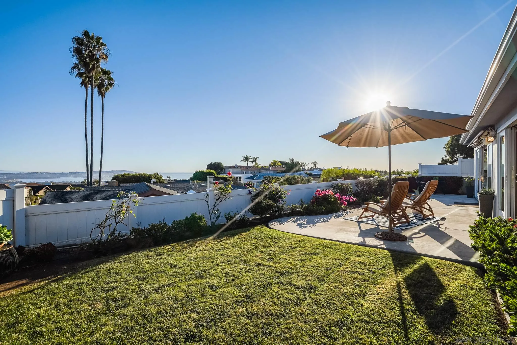 5730 Rutgers Road La Jolla, CA 92037 - Photo 11 of 54 a view of a backyard with a patio and a fire pit