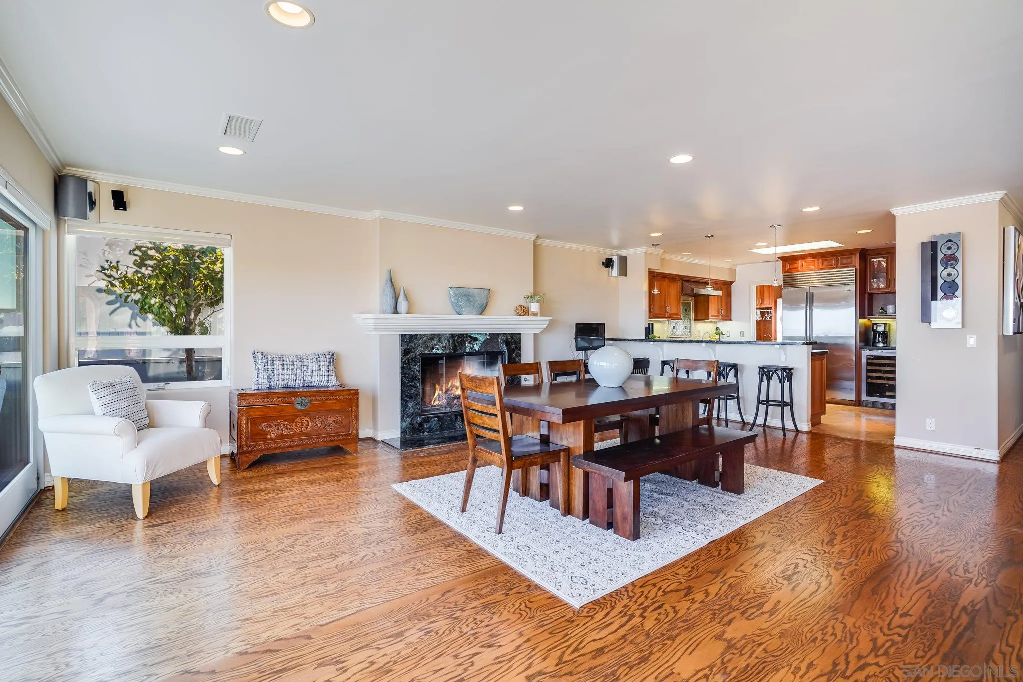 5730 Rutgers Road La Jolla, CA 92037 - Photo 13 of 54 a living room with lots of furniture and kitchen view