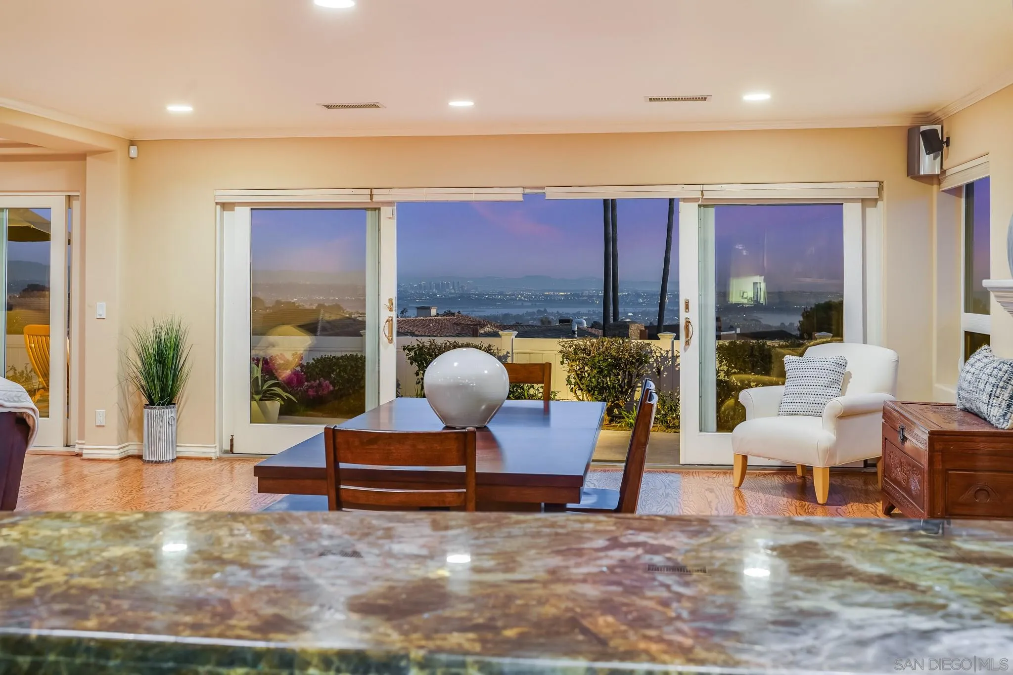 5730 Rutgers Road La Jolla, CA 92037 - Photo 24 of 54 a living room with furniture and a floor to ceiling window