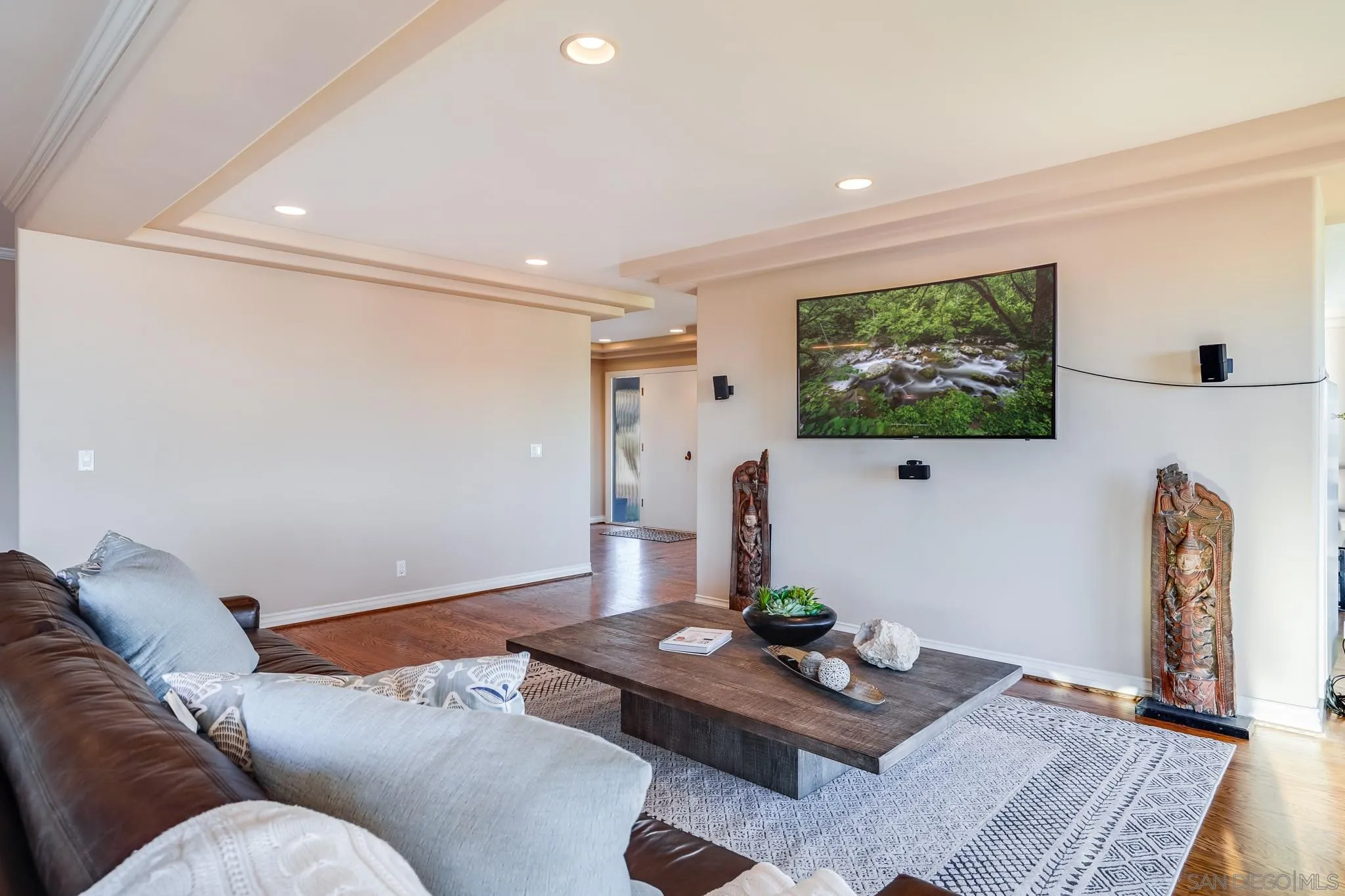 5730 Rutgers Road La Jolla, CA 92037 - Photo 30 of 54 a living room with furniture and a flat screen tv