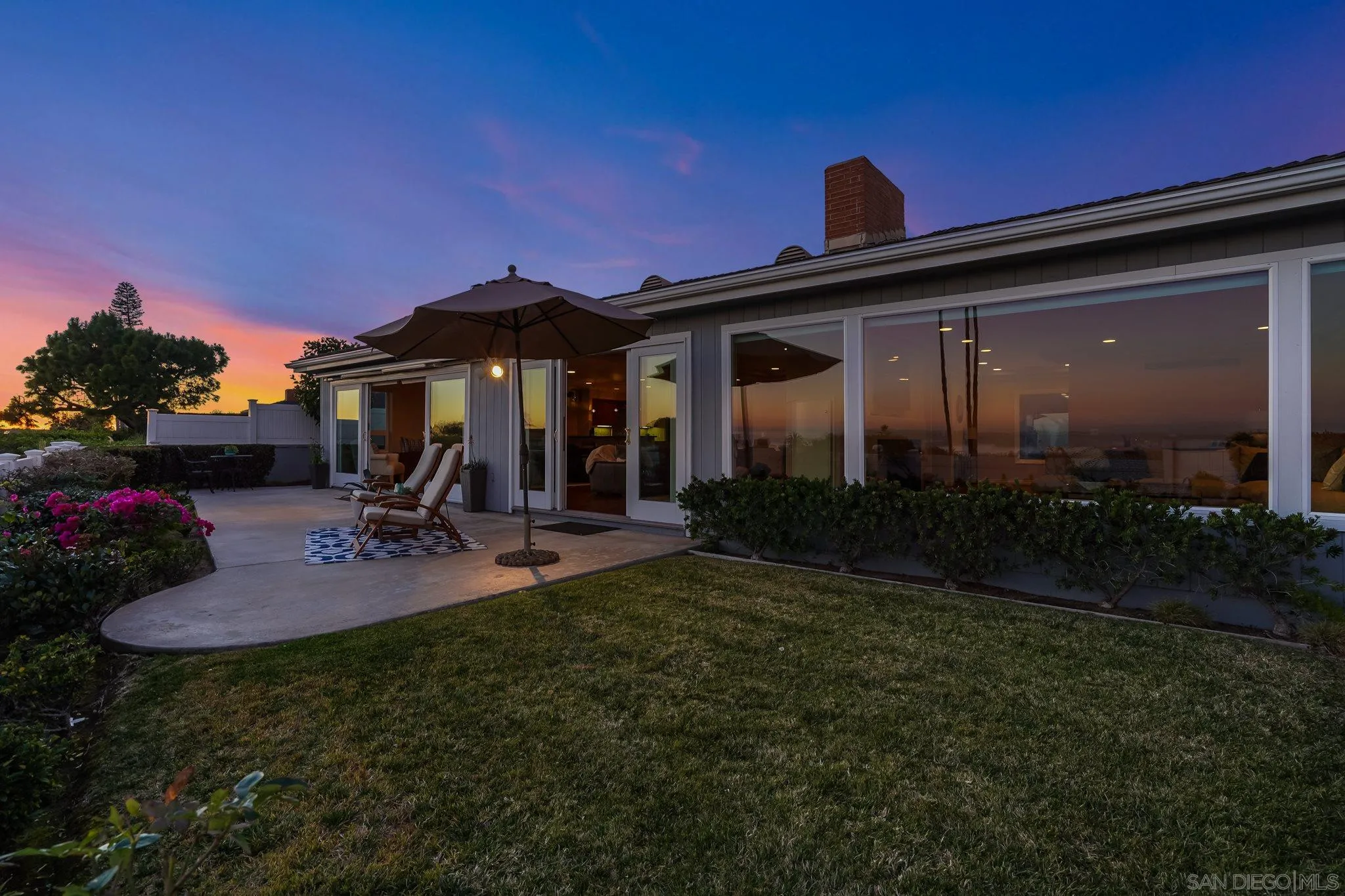 5730 Rutgers Road La Jolla, CA 92037 - Photo 42 of 54 a view of a house with backyard and porch