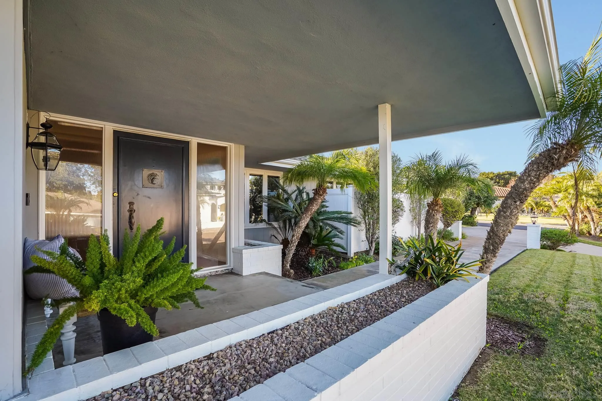 5730 Rutgers Road La Jolla, CA 92037 - Photo 47 of 54 a house view with a garden space