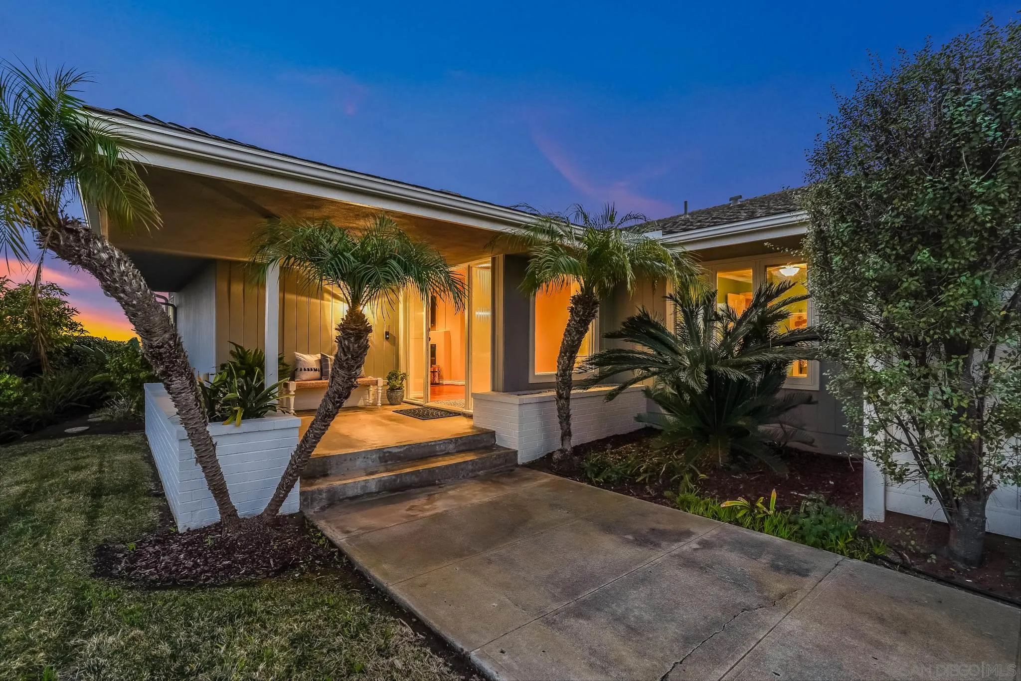 5730 Rutgers Road La Jolla, CA 92037 - Photo 48 of 54 a front view of a house with garden