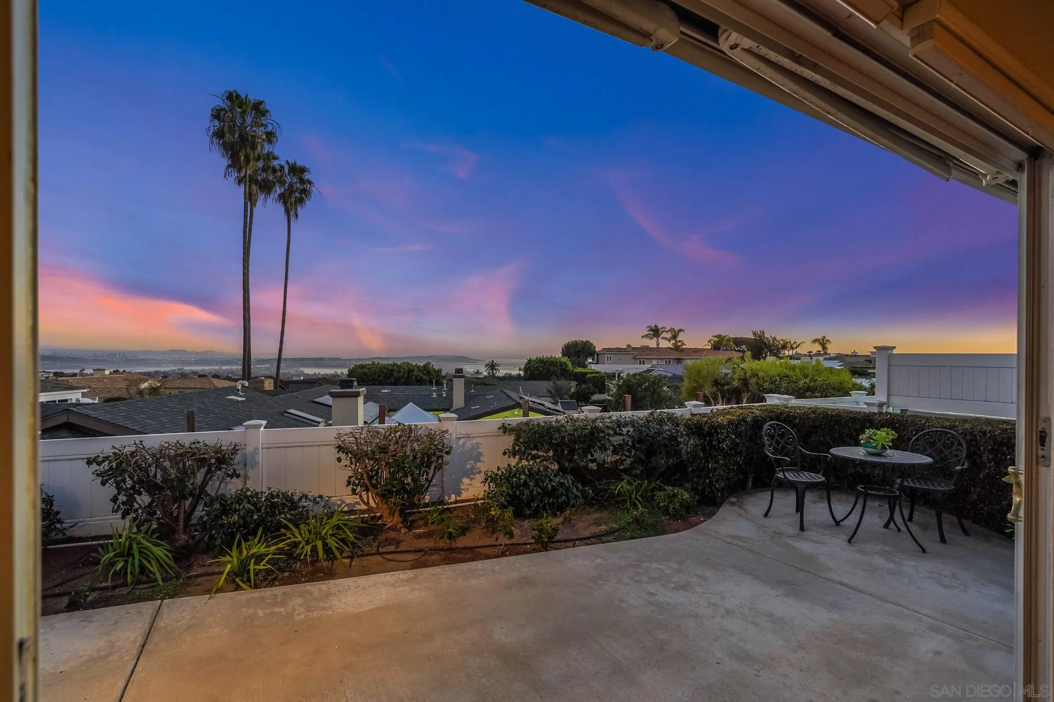 5730 Rutgers Road La Jolla, CA 92037 - Photo 49 of 54 a view of a terrace with a table and chairs