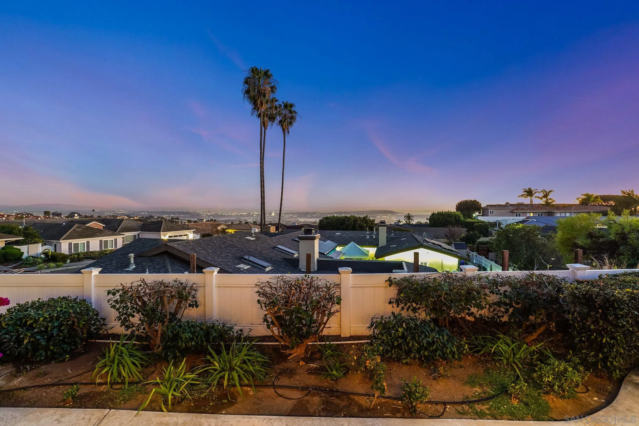 5730 Rutgers Road La Jolla, CA 92037 - Photo 53 of 54 a view of a lake with a house in background