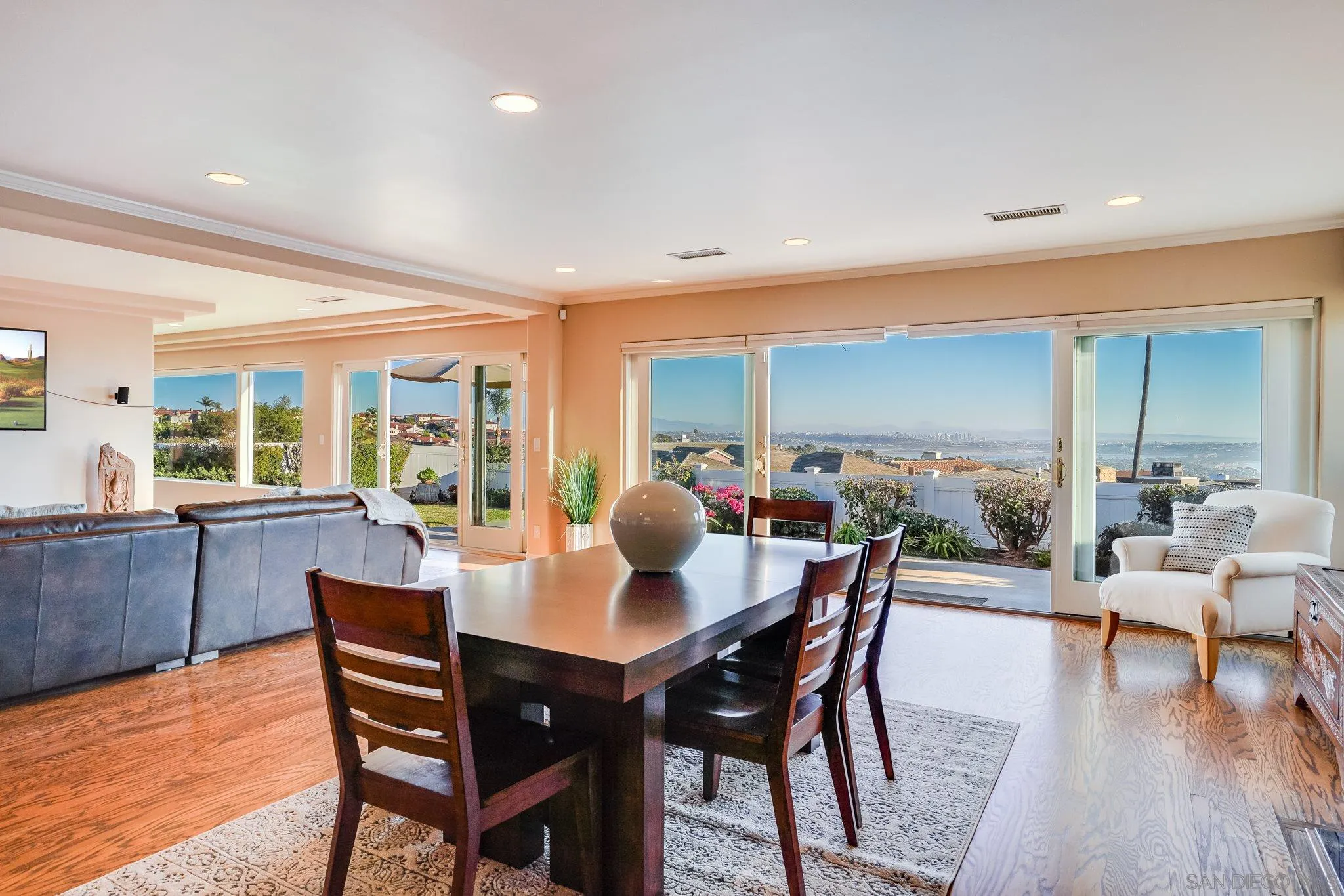 5730 Rutgers Road La Jolla, CA 92037 - Photo 6 of 54 a view of a dining room with furniture window and wooden floor