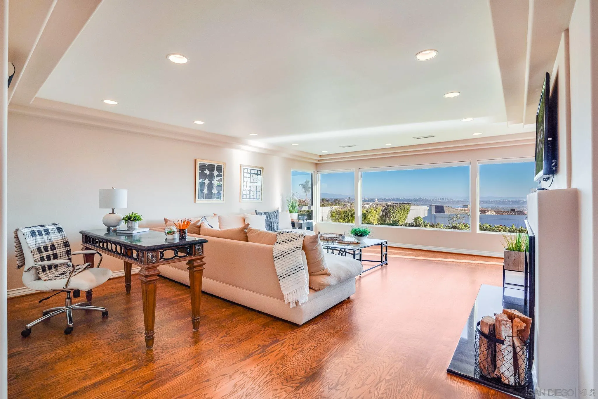 5730 Rutgers Road La Jolla, CA 92037 - Photo 8 of 54 a living room with furniture and a wooden floor