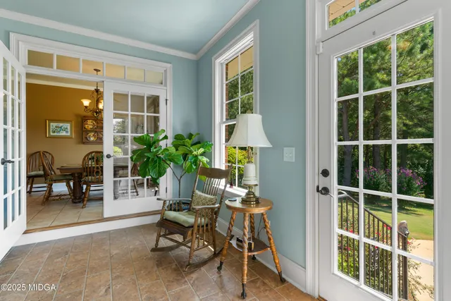 a spacious bathroom with a granite countertop sink a toilet and shower