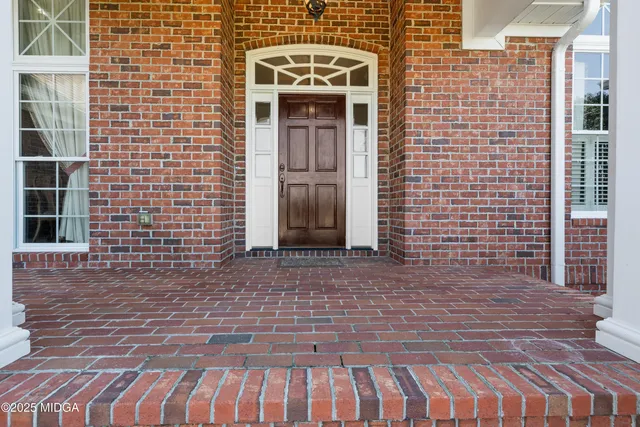 a view of a livingroom with furniture and wooden floor
