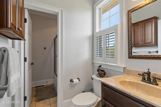 a backyard of a house with a yard and lake view