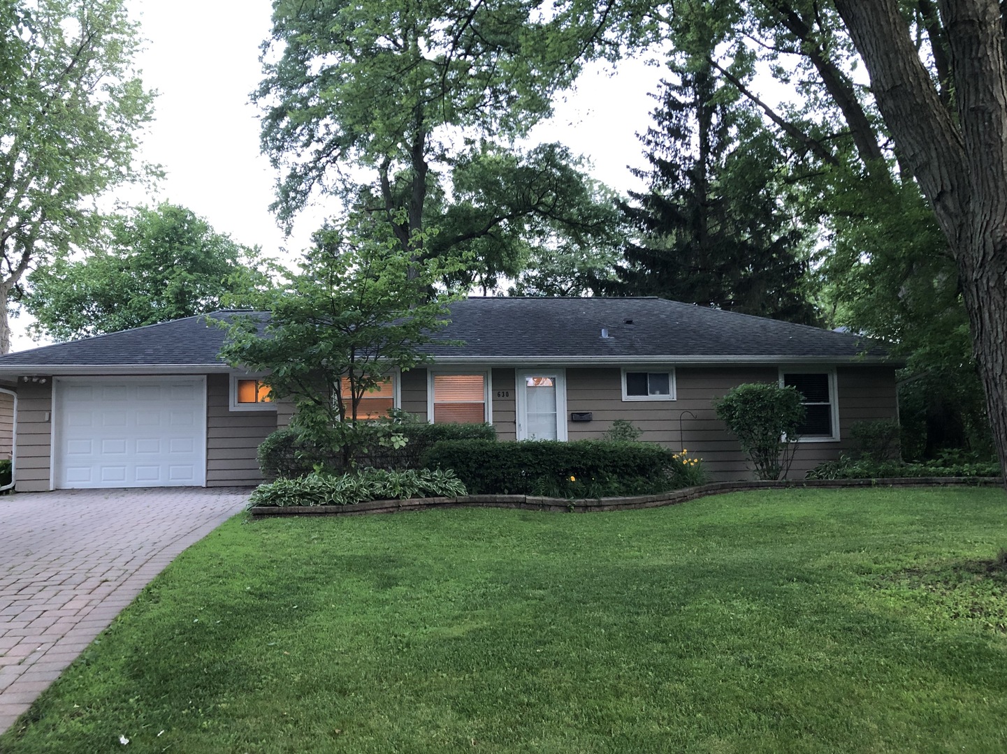 630 Deerpath Road East Dundee, IL 60118 - Photo 1 of 1 a front view of a house with a yard and trees