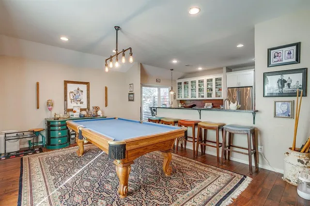 a room with lots of table and chairs