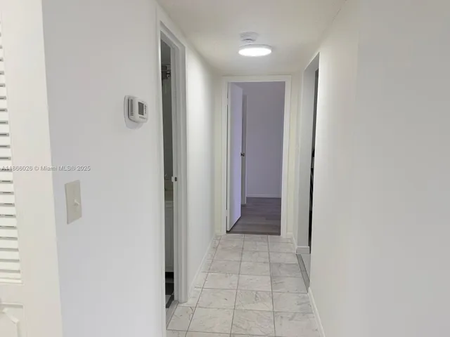 a view of a hallway with a elevator