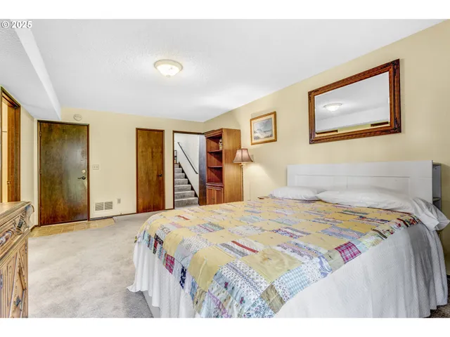 a bathroom with a sink vanity and mirror