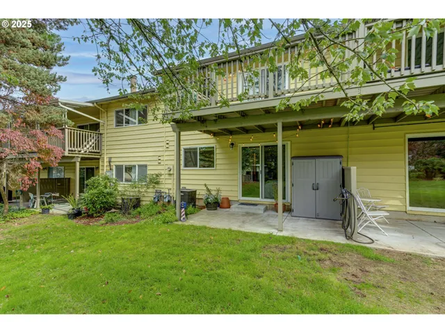 a view of a yard with an outdoor space