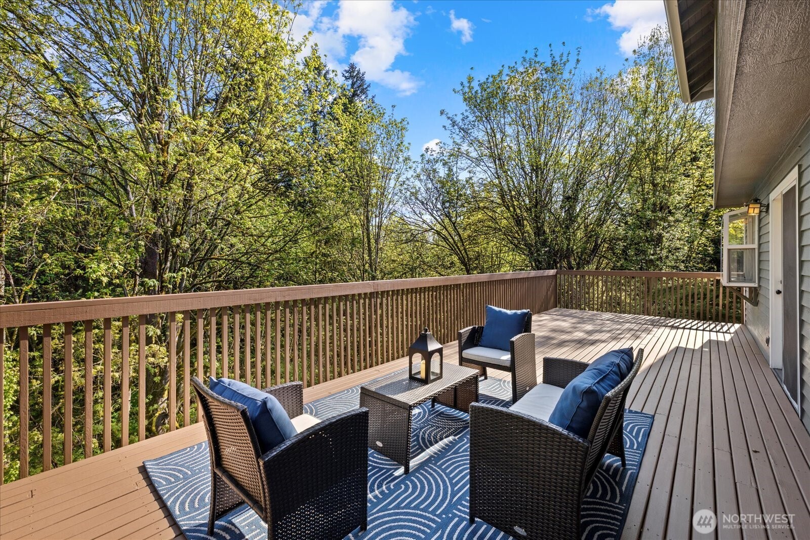10906 Northeast 197th Street Bothell, WA 98011 - Photo 19 of 38 a view of a patio with lawn chairs