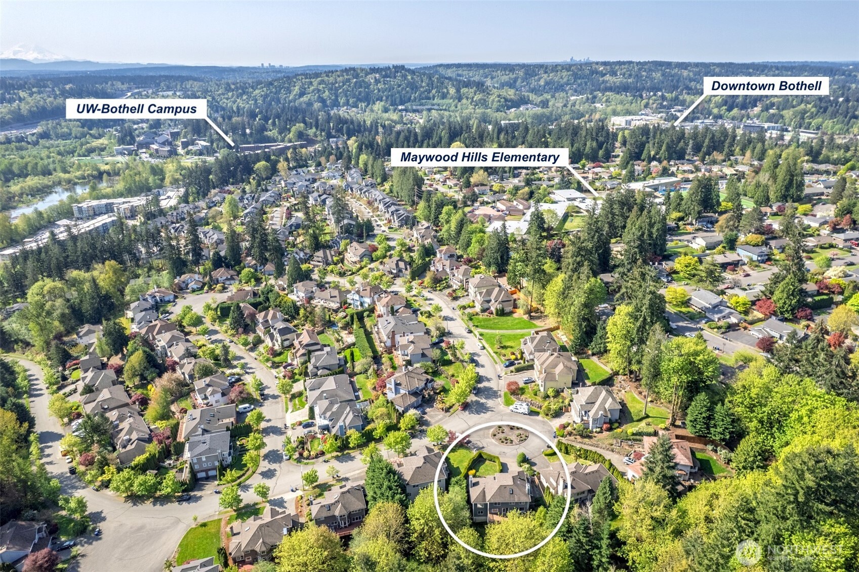 10906 Northeast 197th Street Bothell, WA 98011 - Photo 3 of 38 a view of a city